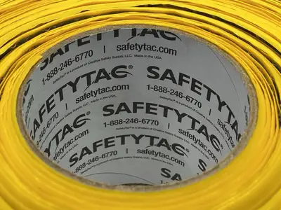 USED SAFETYTAC YELLOW FLOOR MARKING TAPE 4" X 100'