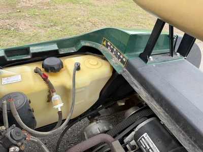(1) 2014 E-Z-Go golf cart with a Kawasaki gas engine, does not include Club canopy, ball carrier, fo...