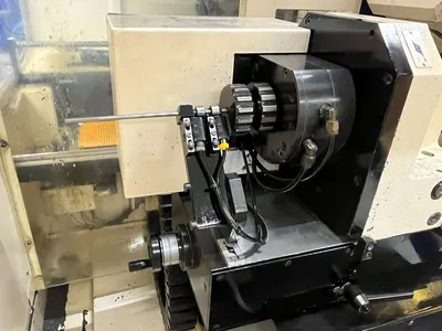 USED 1999 ROLLOMATIC CNC600X