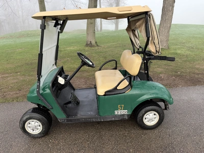 (1) 2017 E-Z-Go golf cart with a Kawasaki gas engine, model 625111G01, includes canopy, ball cover, ...