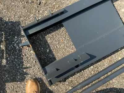 New JCT Bale Spear Skid Steer Attachment, Universal Quick Attach, Has Two Spears that Stick Out Appr...