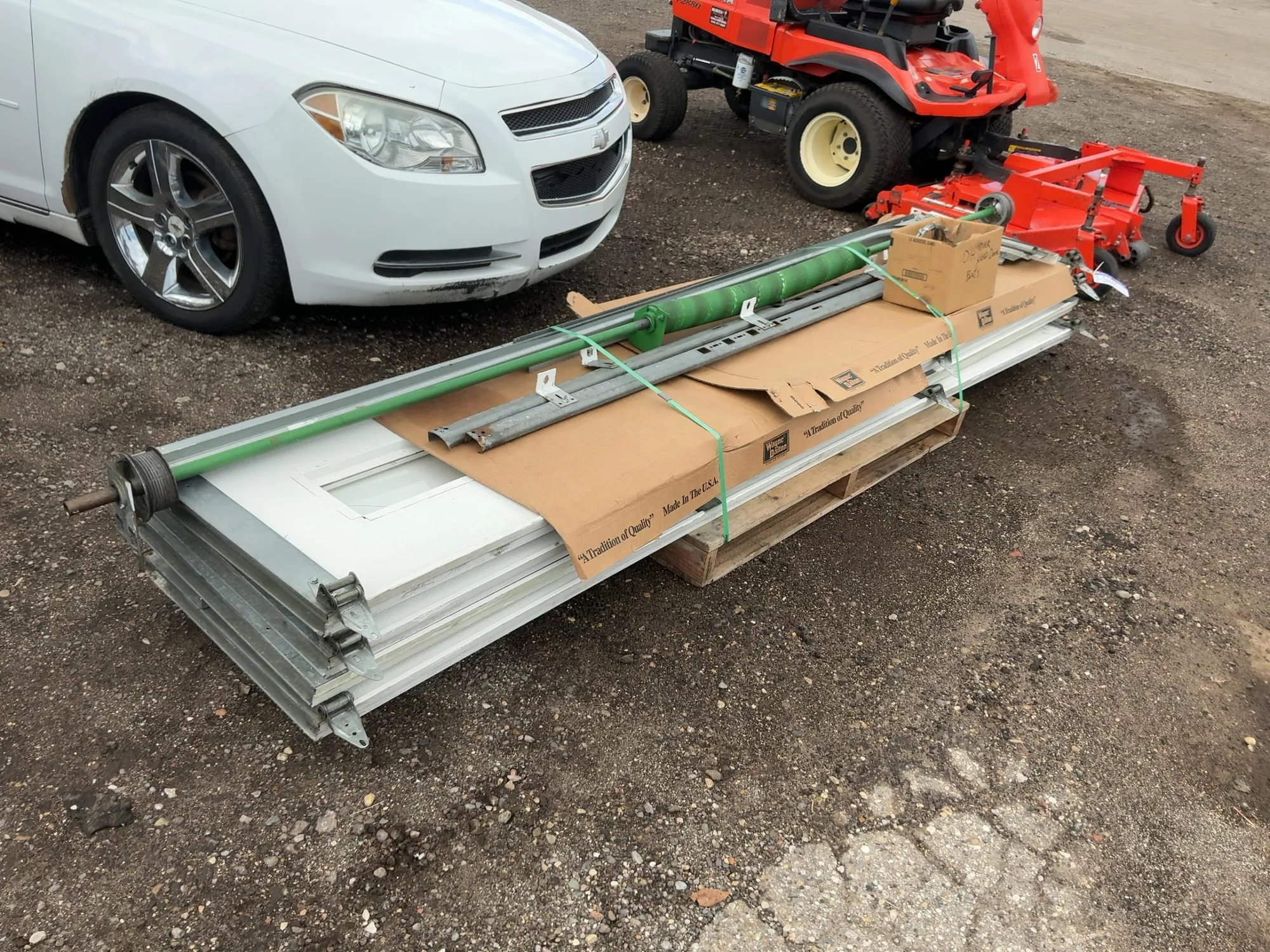 Used 8’ Tall x 10’ Wide Insulated Roll Up Door, comes with tracks, spring, and hardware, four panels...
