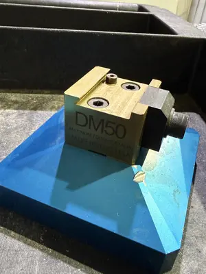 (2) 5th Axis R96-DM50 Riser Plates One With DM50 Dovetail Vise/Clamp and (1) With Two 5th Axis