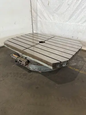 84" X 60" STONE CO ROTARY TABLE. STOCK # 1120524