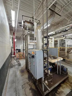 WEMHONER 5’ x 10’ SINGLE-OPENING SHORT-CYCLE FEED-THROUGH HOT PRESS WITH AUTOMATIC MATERIAL MEASURING/PRESSURE SYSTEM