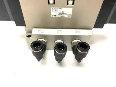 USED SMC 4/5 PORT SOLENOID VALVE 3-POSITION DC21-26V