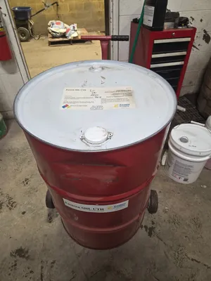 2 new 55 gallon drums of oil. (1) Shell 85w-140 gear oil and (1) SHL-UTH Full Synthetic Hydraulic oi...
