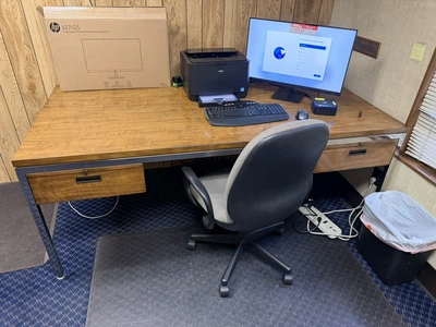 Contents of office furniture, includes (1) steel frame, wood desk, 76" x 38", (2) rolling office cha...