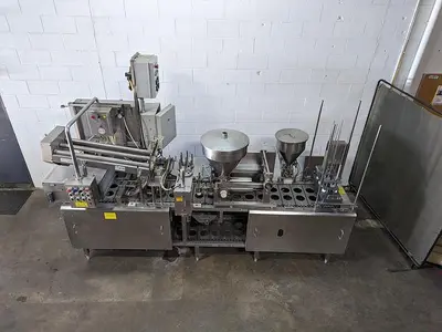 USED 1994 MODERN PACKAGING, INC SL-1X2