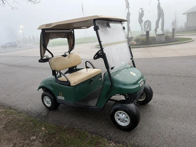 (1) 2015 E-Z-Go golf cart with a Kawasaki gas engine, includes canopy, ball cover, club cover, fold-...