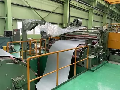 72" (1850mm) x .125" (3.2mm) x 55,000# Slitting Line with Automatic Tooling and Knife Setup