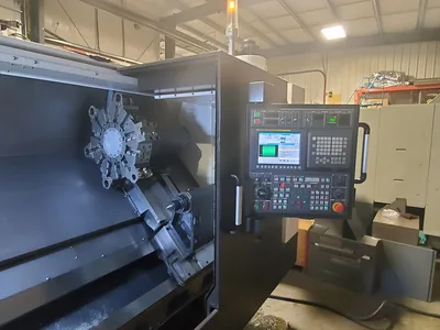 Used HYUNDAI WIA CENTER CNC Lathes Alberta CA | Lamarche Machinery Inc #1259519