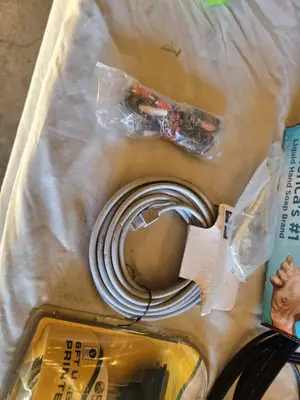 Various audio, video, and network cables, including RCA stereo audio cables, CAT6 network cables, VGA extension cables, USB printer cables, and more.