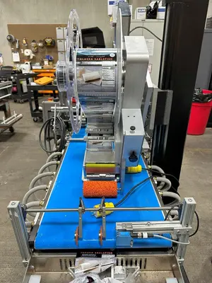 USED MFT 550 IP³ FEEDER AND LABELING SYSTEM