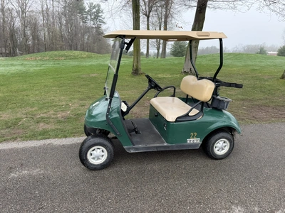 (1) 2015 E-Z-Go golf cart with a Kawasaki gas engine, does not include Club canopy, includes ball wa...