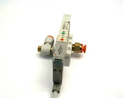 USED SMC POSITION CLOSED CENTER SOLENOID VALVE ON MANIFOLD