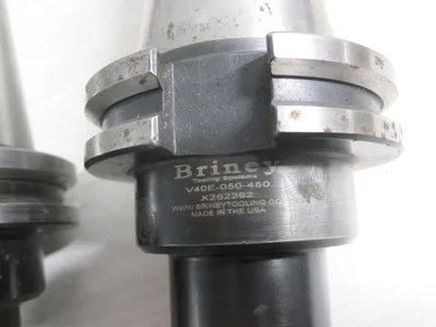 USED BRINEY CAT40