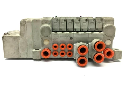 USED SMC PNEUMATIC PLUG IN MANIFOLD W/ VALVES