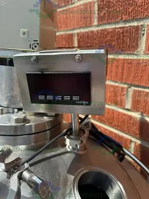 USED PRECISION 250 LITER STAINLESS STEEL JACKETED REACTOR 45 PSI W/ LIGHTNIN MIXER.