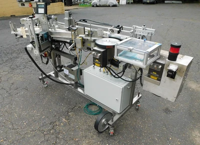 USED NEWMAN WRAP AROUND LABELER NV II