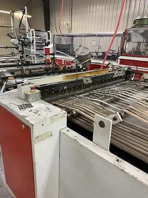 USED FMC SPLIT ROLL SIDEWELD MACHINE