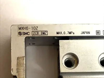 NEW SMC COMPACT SLIDE TABLE 6MM BORE 10MM STROKE GUIDED CYLINDER