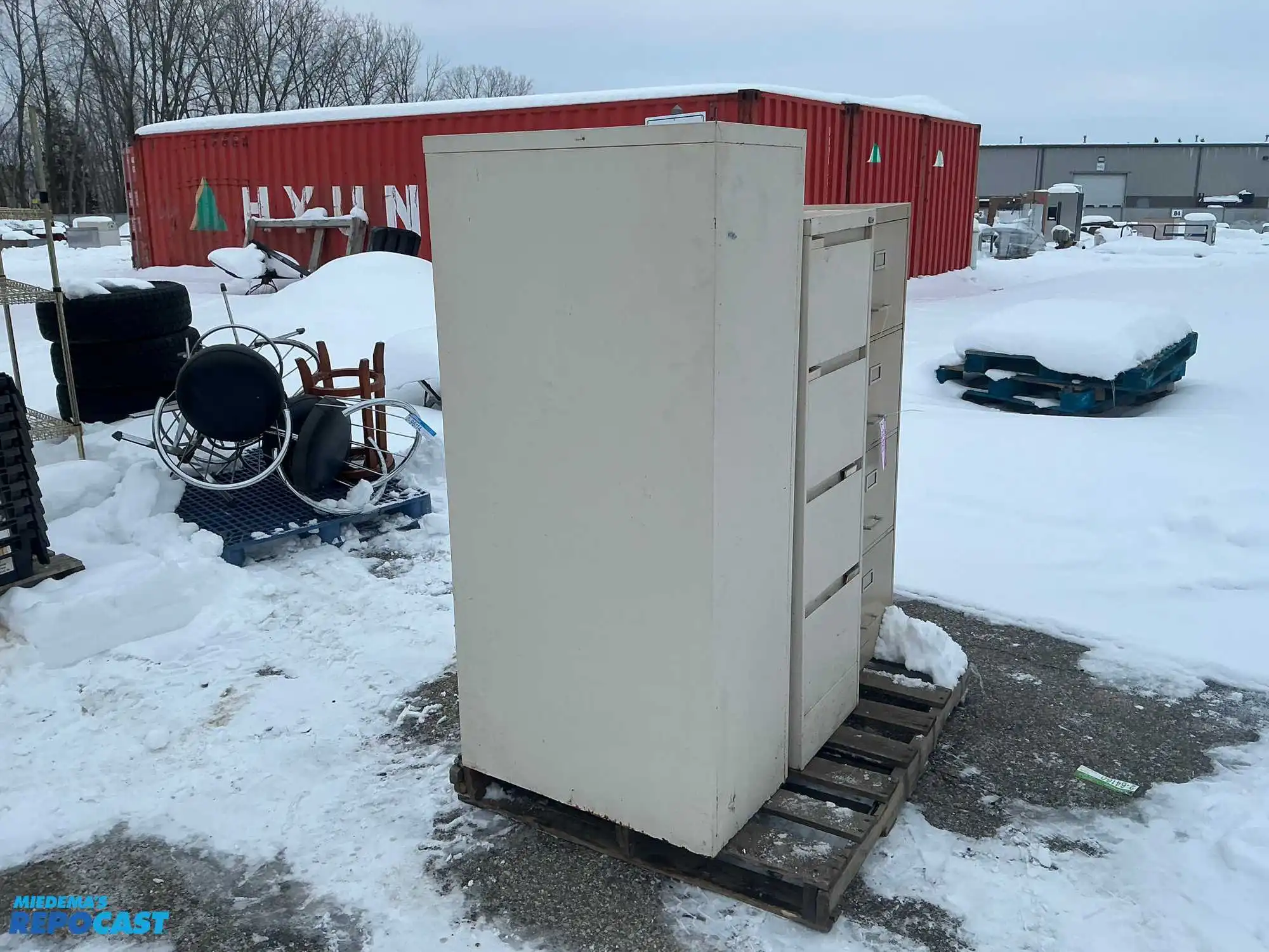 Lot of (2) metal filing cabinets including a 15”x29”x52” cabinet with 4 drawers and a 15”x29”x59”...