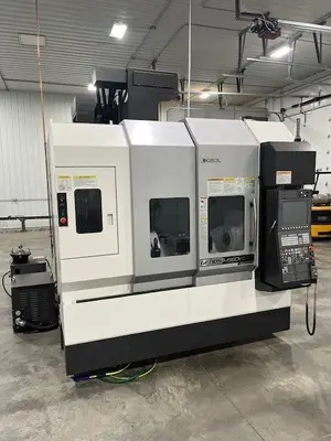 OKUMA GENOS M560V-5AX Vertical Machining Centers | Tight Tolerance Machinery (1)