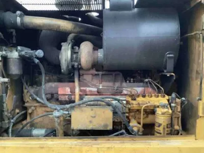 1998 Caterpillar 140HNA