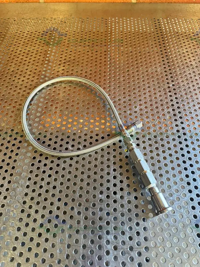 Used SWAGELOK SS-4CP4-10 CHECK VALVE W/ 31" STAINLESS STEEL BRAIDED HOSE 3/4" TO 1/2" Hoses California US | Equipment Lab #1427417