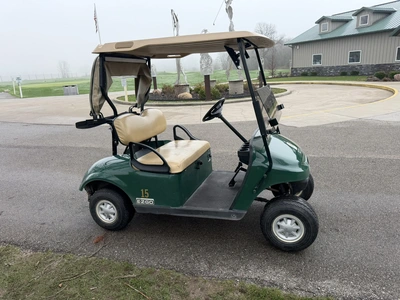 (1) 2015 E-Z-Go golf cart with a Kawasaki gas engine, includes Club canopy, ball washer, fold-down w...