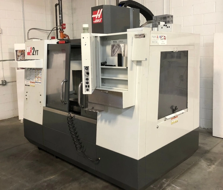 Used 2011 HAAS VF-2YT Vertical Machining Centers Vermont US | Two Spade Machinery LLC #506827