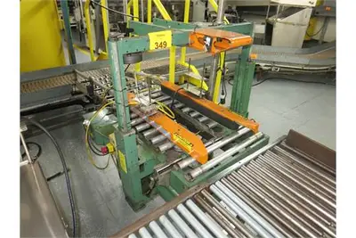 Signode case sealer, top/bottom seal w/ roller conveyors
