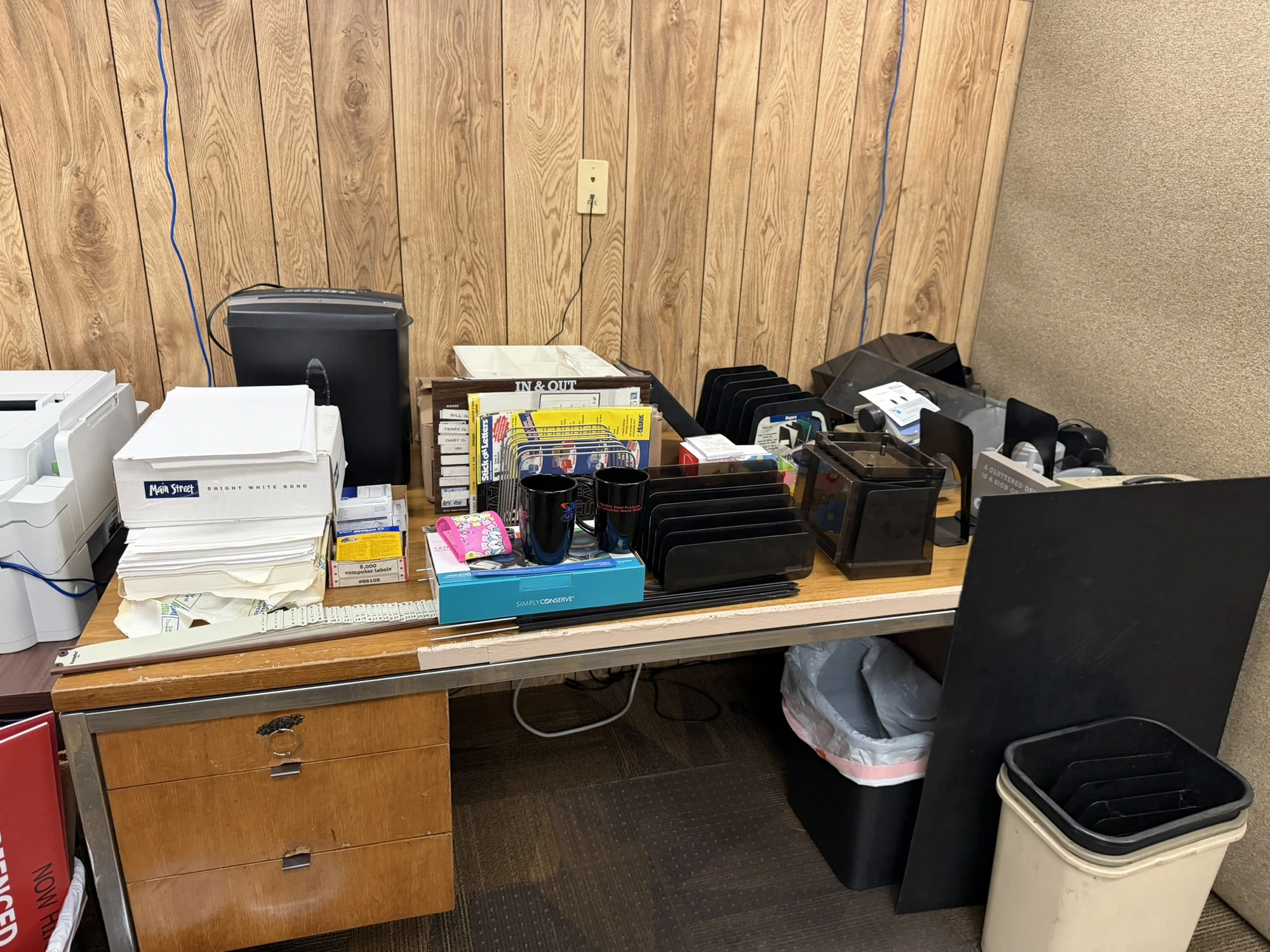 (1) 80" wooden desk with contents, includes paper shredder, paper organizers, Rolodex cards, coffee ...