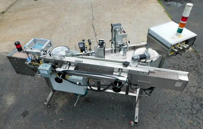 USED NEWMAN WRAP AROUND LABELER NV II