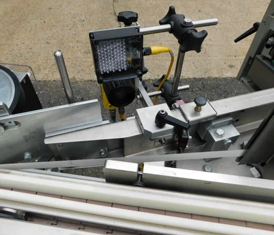 USED NEWMAN WRAP AROUND LABELER NV II