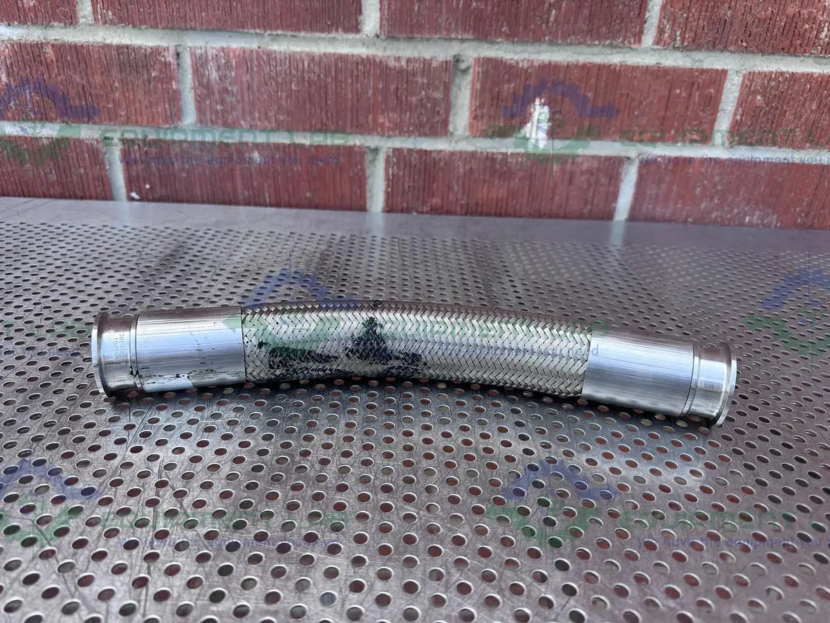 USED HARRINGTON STAINLESS STEEL BRAIDED HOSE 15" W/ 1 1/2" SANITARY FITTING