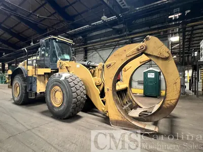 USED 2013 CAT 980K WHEEL LOADER WITH LOG FORKS