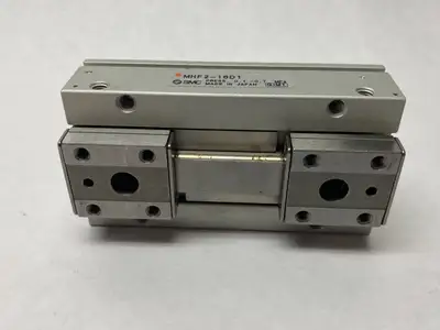 USED SMC LOW-PROFILE PNEUMATIC GRIPPER, 2-FINGER, 16MM STROKE PER JAW
