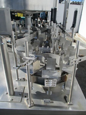 Gravity feed, 1 gallon bottle filling machine w/ 24 heads