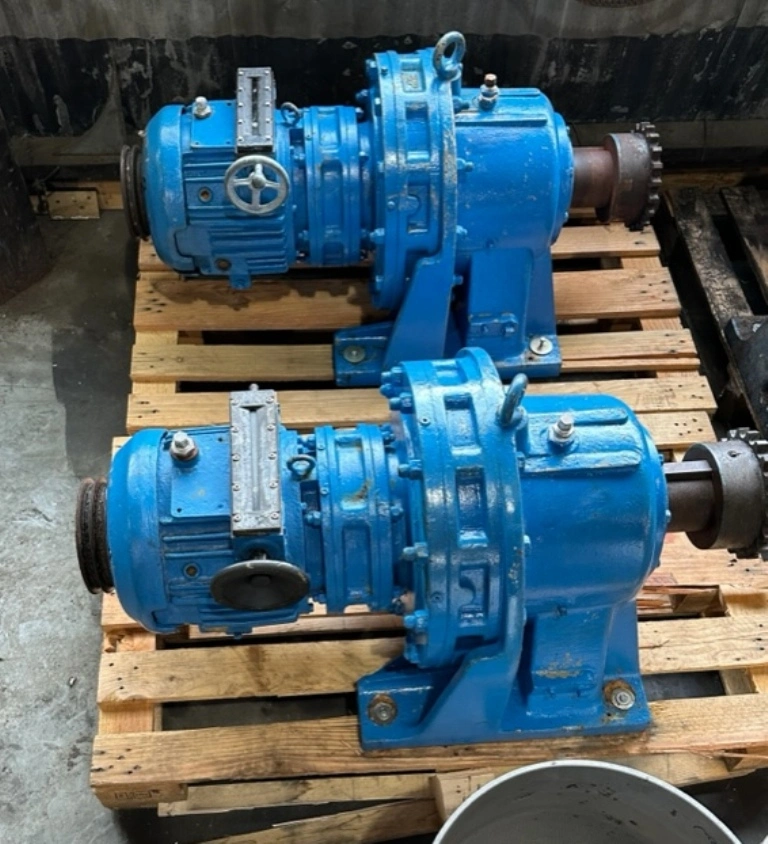 Sumitomo drive for HX-550 screw press with motor.