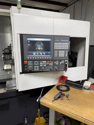 USED 2016 OKUMA GENOS L300MYW