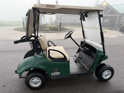 (1) 2015 E-Z-Go golf cart with a Kawasaki gas engine, includes canopy, ball cover, club cover, fold-...