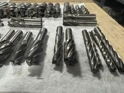 USED SET OF END MILLS VARIOUSE SIZE AND STYLE