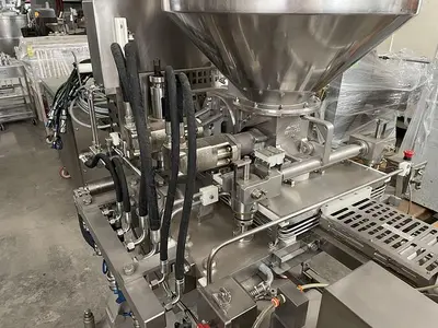 USED NUTEC MANUFACTURING 725 PORTIONER