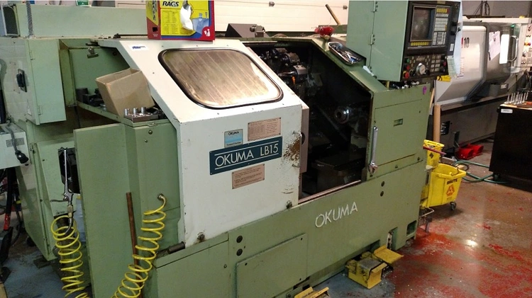 Used 1988 OKUMA LB15 CNC Lathes Vermont US | Two Spade Machinery LLC #507139