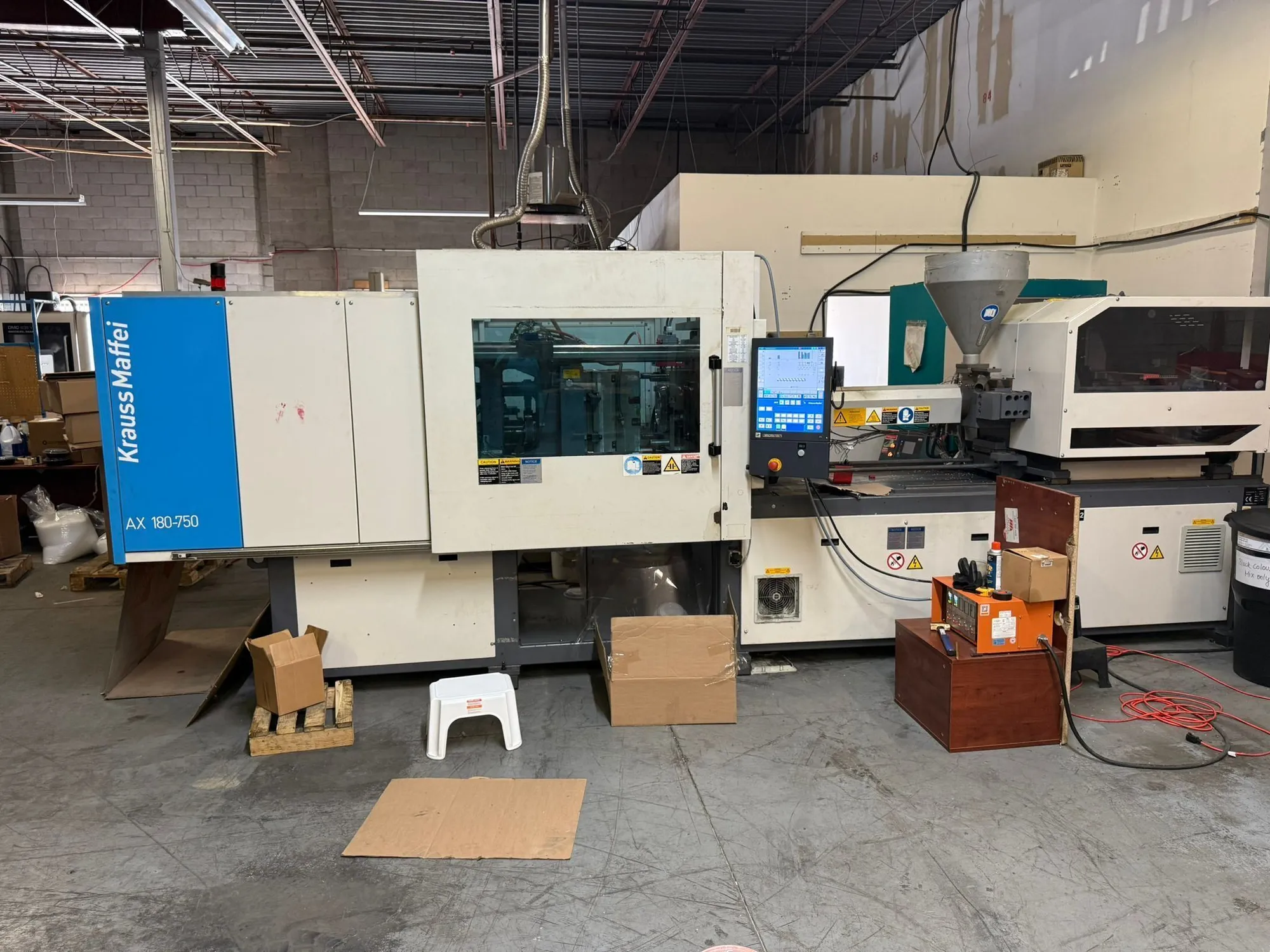 USED 2011 KRAUSS MAFFEI KM180-750 AX