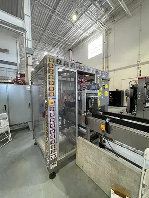 USED 2006 SYMPAK IPL 400C CASE PACKEER