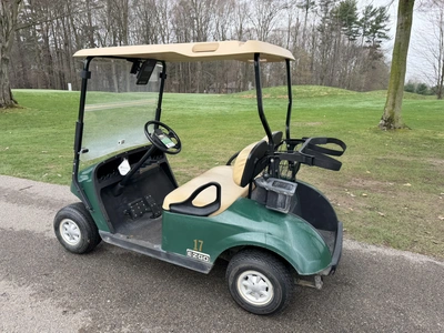 (1) 2015 E-Z-Go golf cart with a Kawasaki gas engine, does not include Club canopy, includes ball wa...
