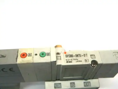 USED SMC POSITION CLOSED CENTER SOLENOID VALVE ON MANIFOLD